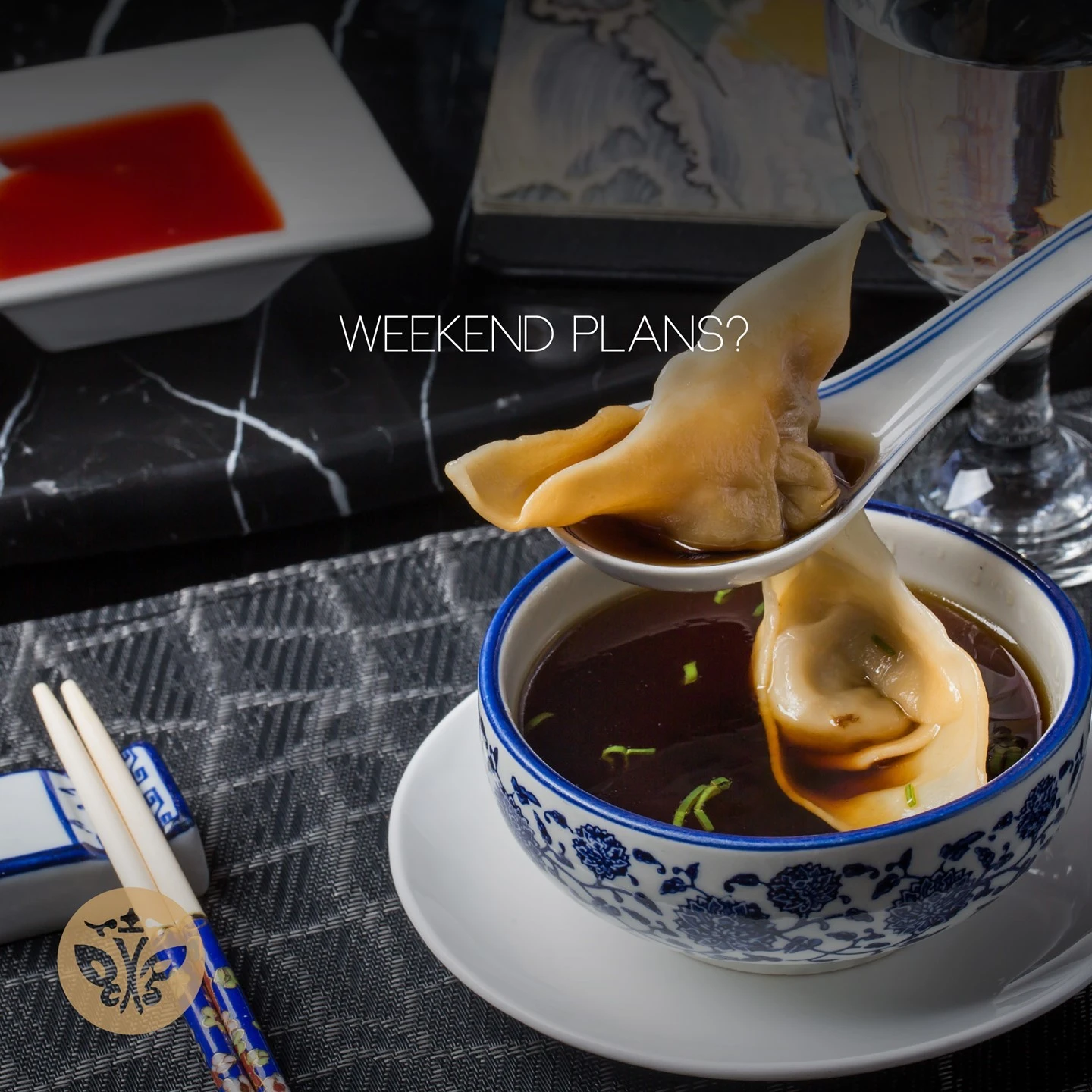 Peking wonton in a blue porcelain spoon